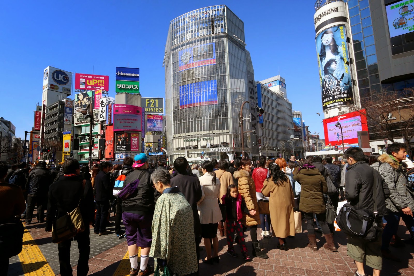 Heading to Shibuya famous pedestrian crossing in dramas and movies, outside of Shibuya Station of Tokyo, Japan Heading to Shibuya famous pedestrian crossing in dramas and movies, outside of Shibuya Station of Tokyo, Japan