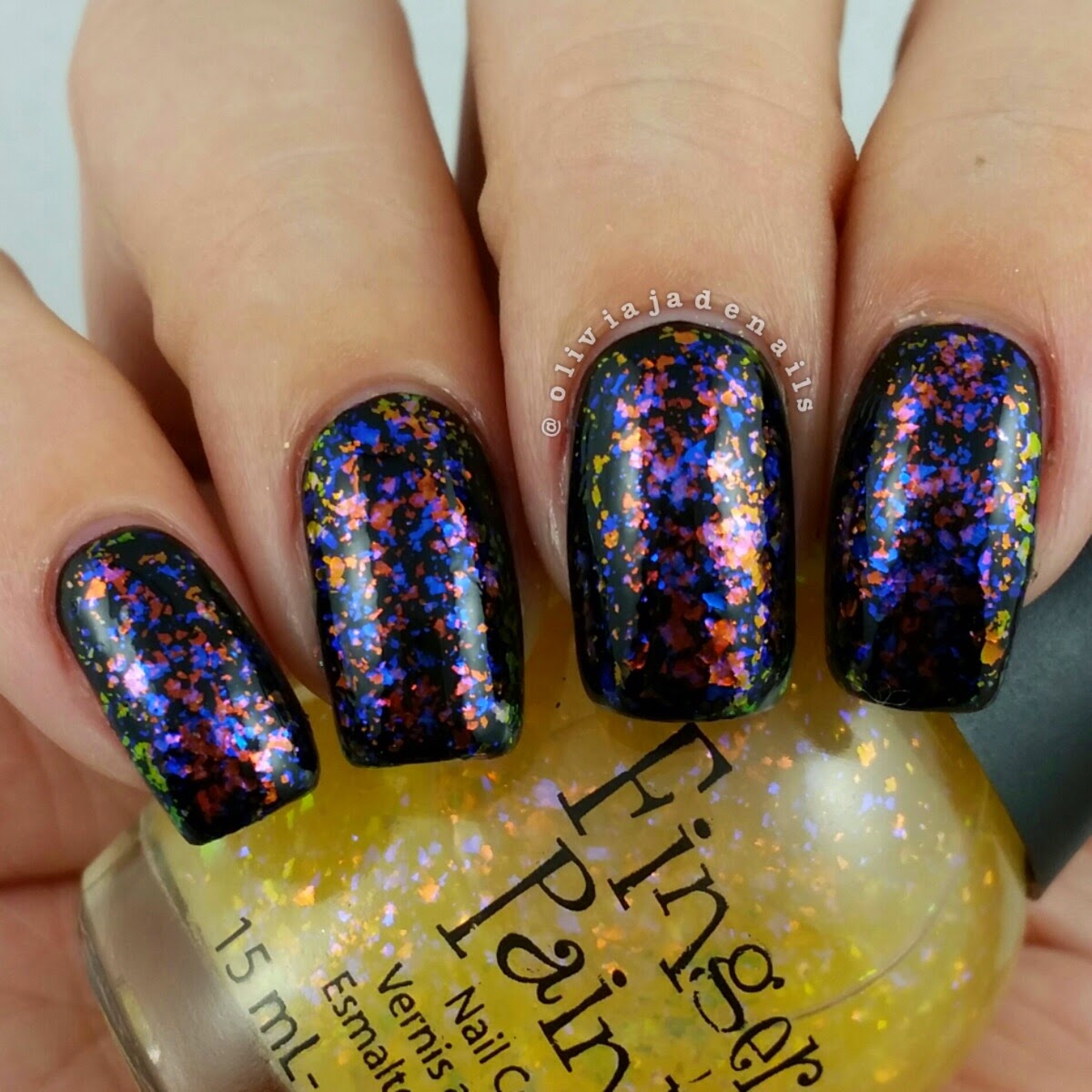 Finger Paints Asylum (over black) swatched by Olivia Jade Nails