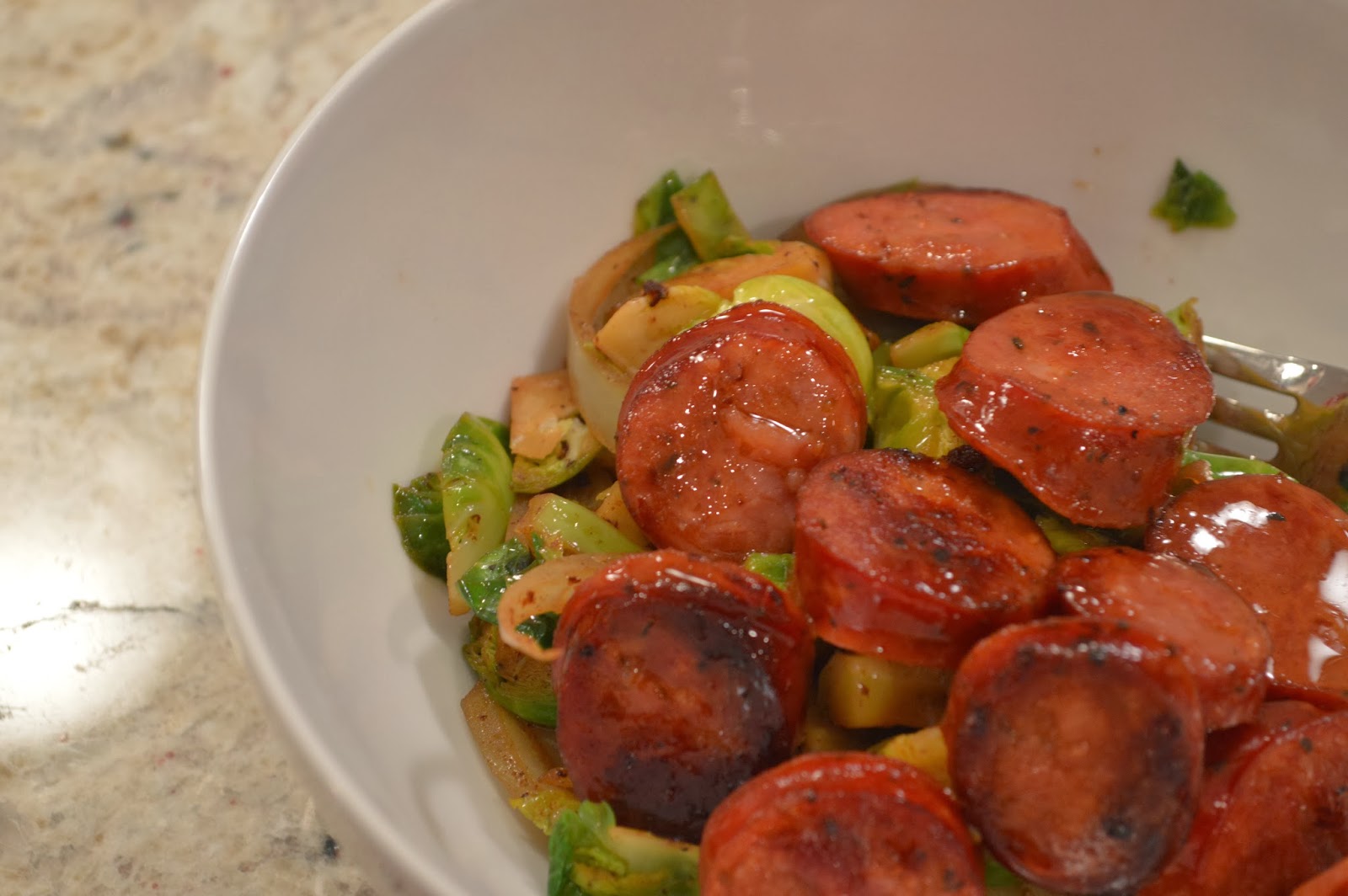peace. love. & good food. Shaved Brussels Sprouts Salad + Andouille