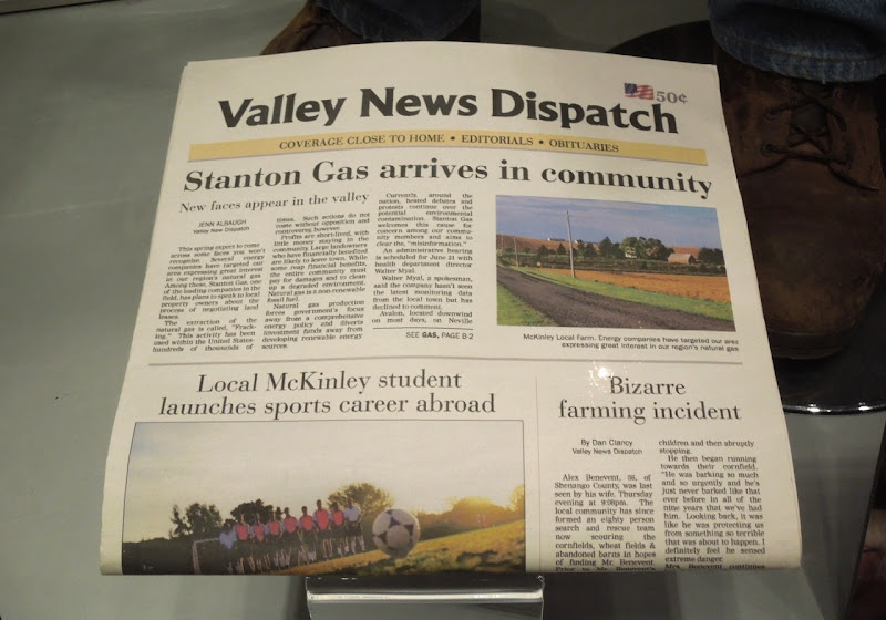 Promised Land local newspaper prop