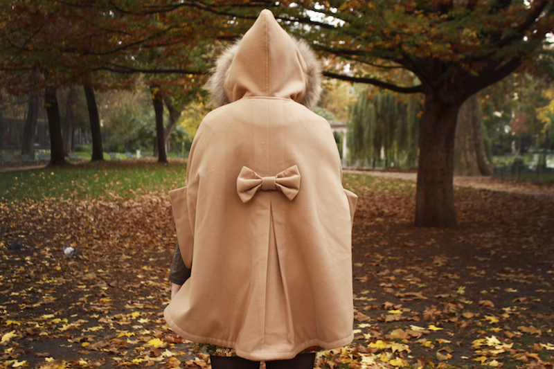 Brown cape with a bow in the back