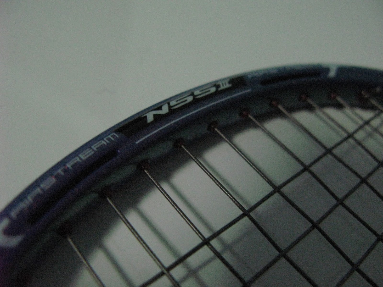 Head pulls out a racket with a single hole!