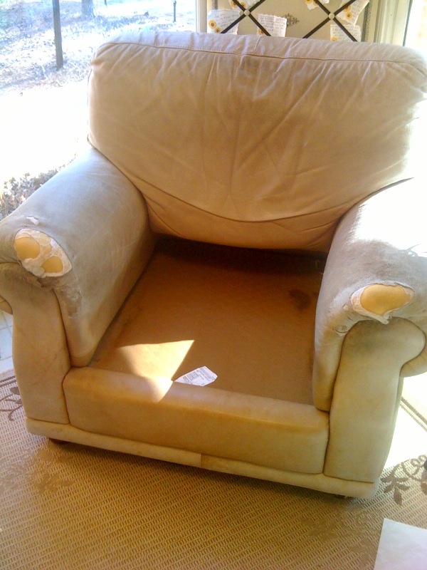 Southern Grace Life Reupholstering a leather chair....