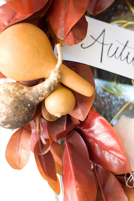 Fall magnoila wreath with dried ghords and autumn sign