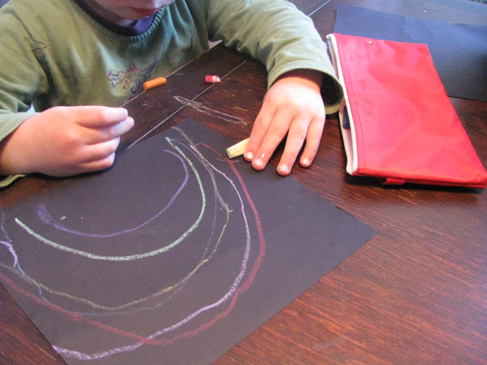 whimsy oil pastels on black paper