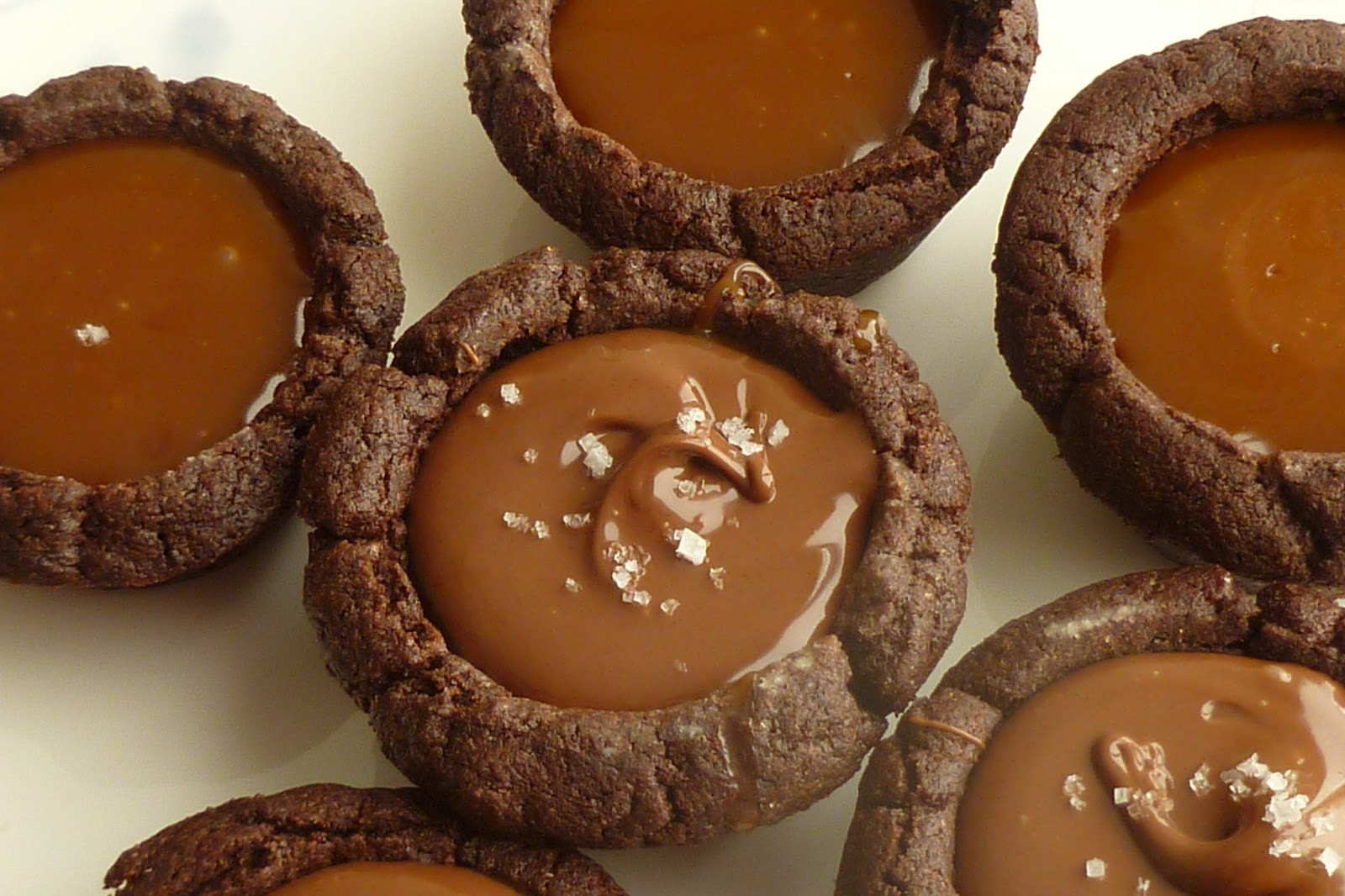The pastry chefs baking salted caramel nutella chocolate tartlets