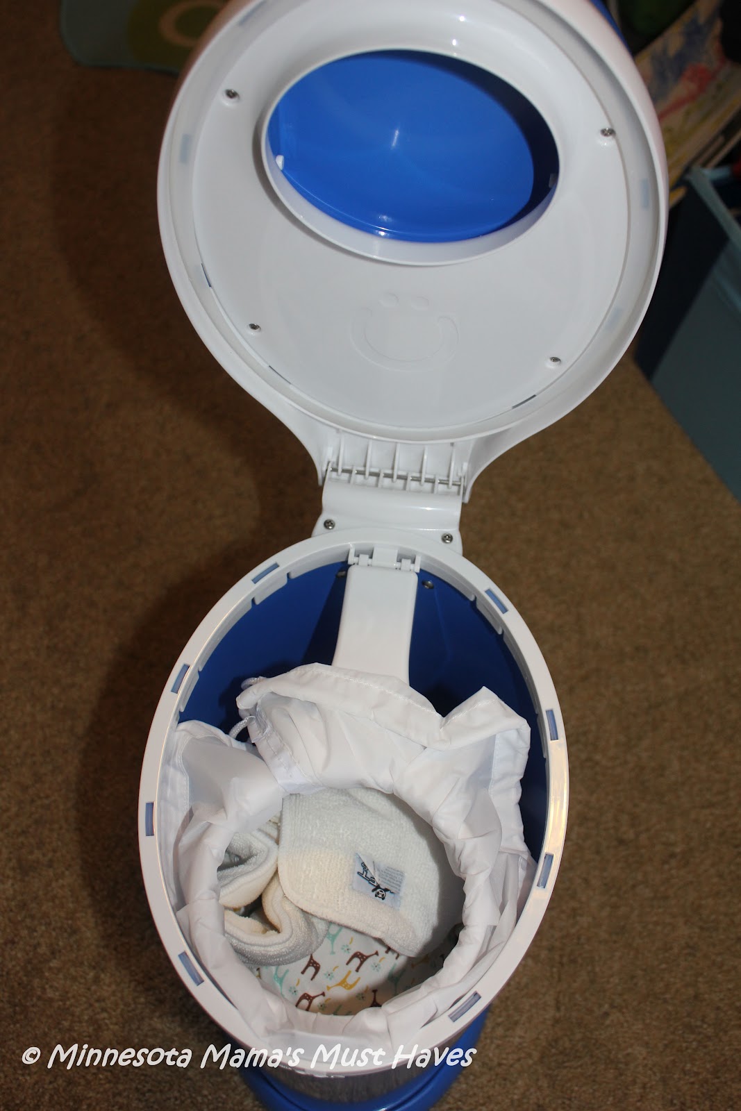 Introducing the Ubbi Diaper Pail! Sleek, Stylish Diaper Pail That Allows You To Use Your Own