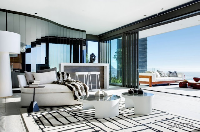 Photo of black and white carpet and furniture in the living room