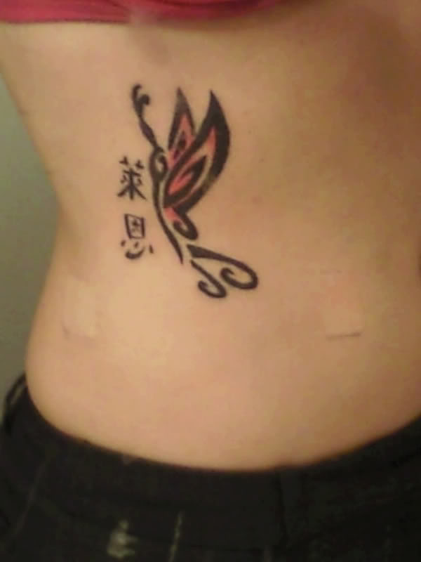 tattoo on back girl. girl tribal tattoo.