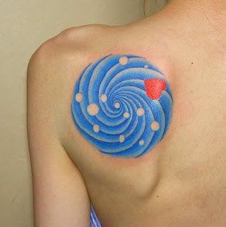 Blue color Spiral tattoo on back