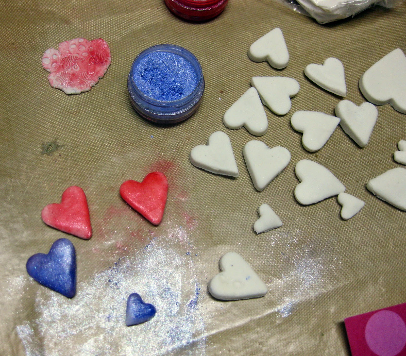 encaustic canvas- love clay hearts