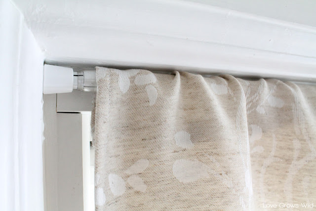 How to Make a Faux Roman Shade by LoveGrowsWild.com #diy #romanshade #curtain