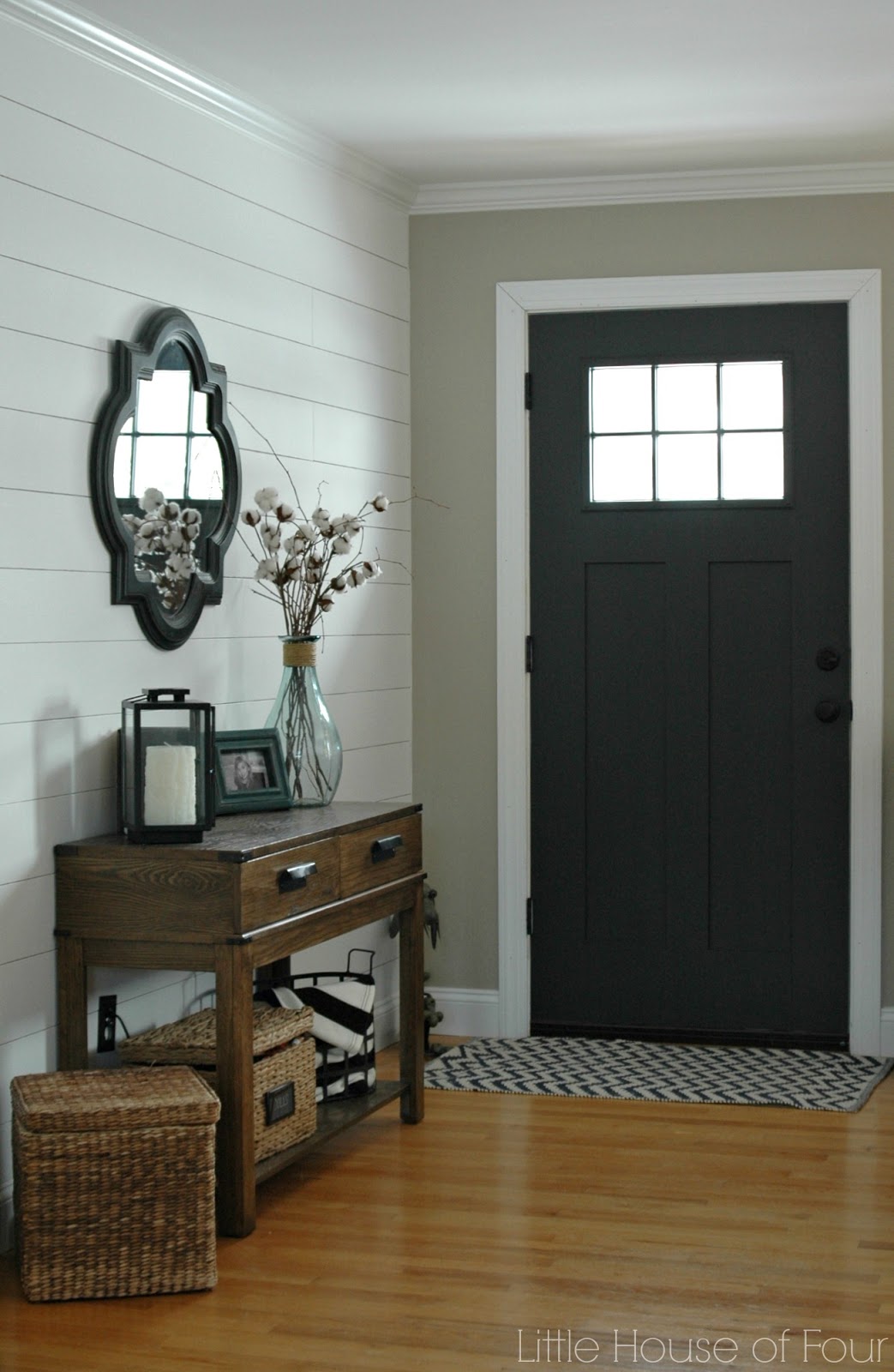 Updating the entryway with Sherwin Williams Iron Ore Little House of