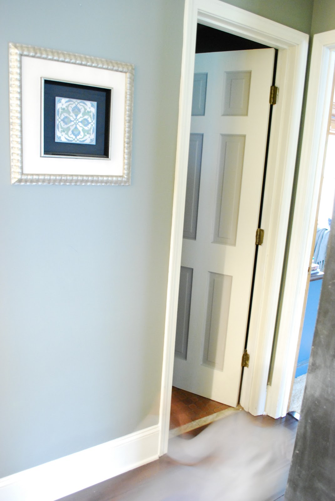 Between Blue and Yellow Painted Bathroom Door