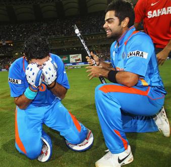 Yuvraj Singh can barely console his emotions, while Virat Kohli is all smiles, India v Sri Lanka, final, World Cup 2011, Mumbai, April 2, 2011