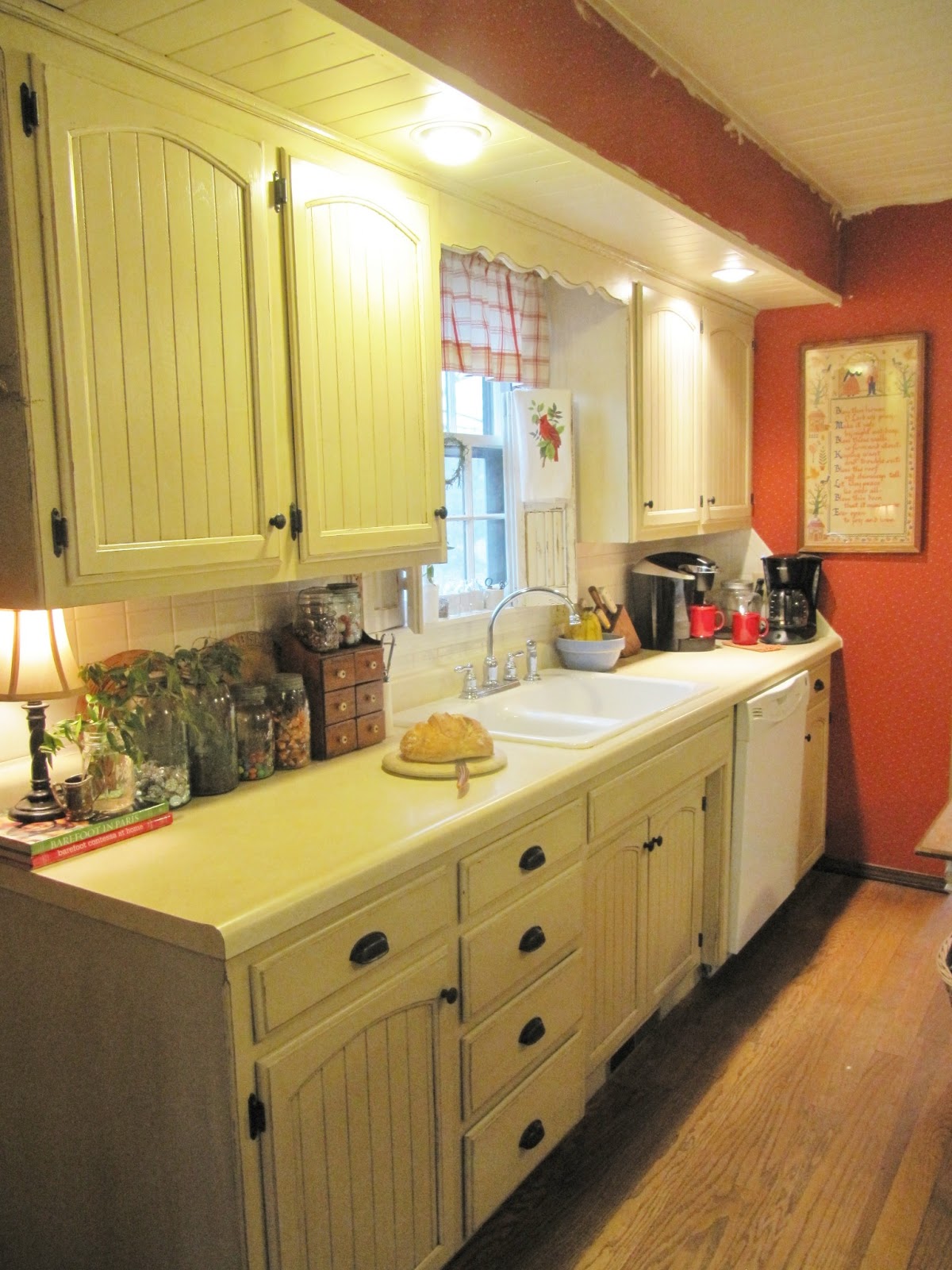 Uncategorized Mennonite Kitchen Cabinets summer sundays my kitchen cabinets presently theyre covered with a dated red wallpaper and i think they need to be lightened linen or maybe little darker because the is dark