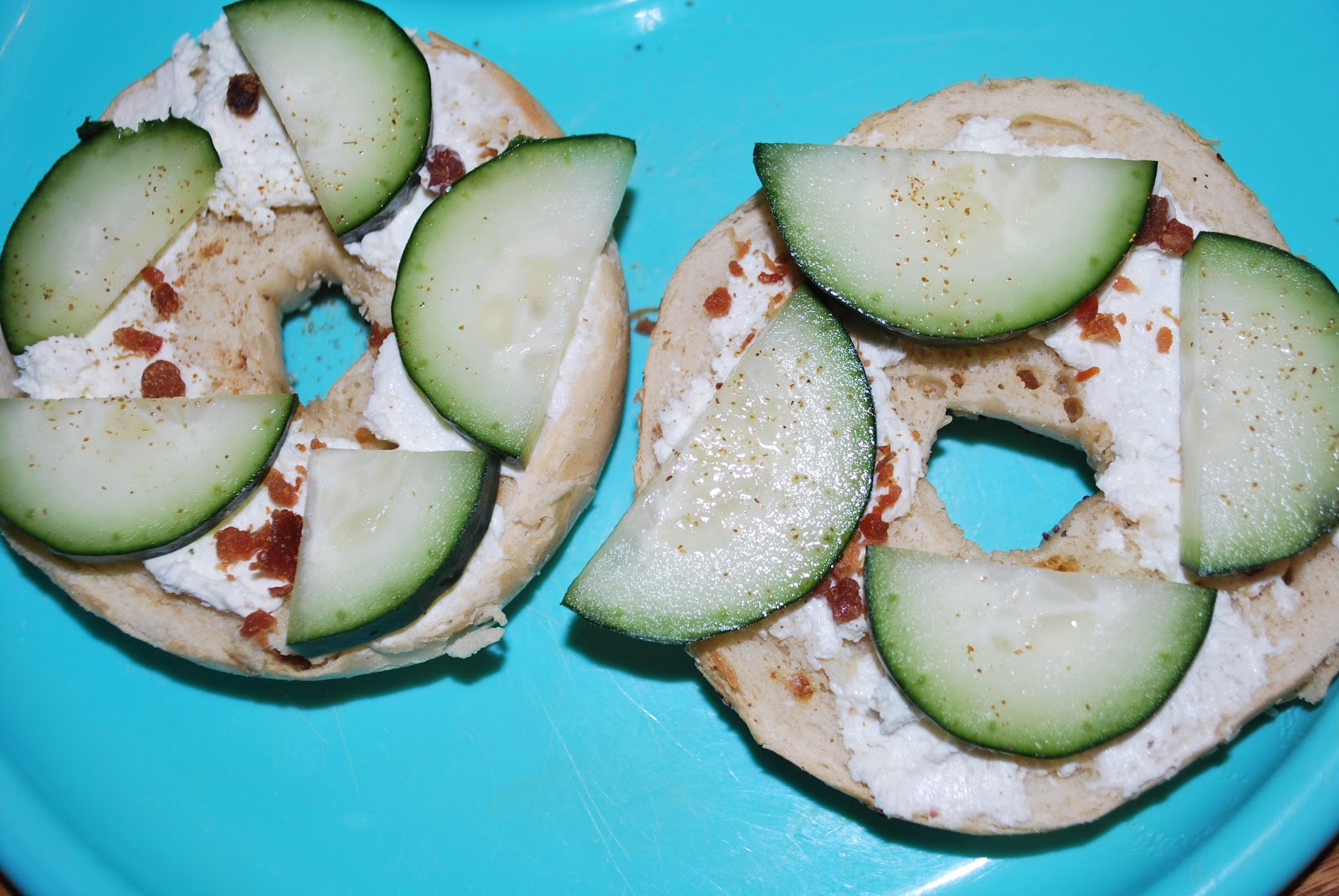 Cream cheese, bacon, cucumber breakfast bagel