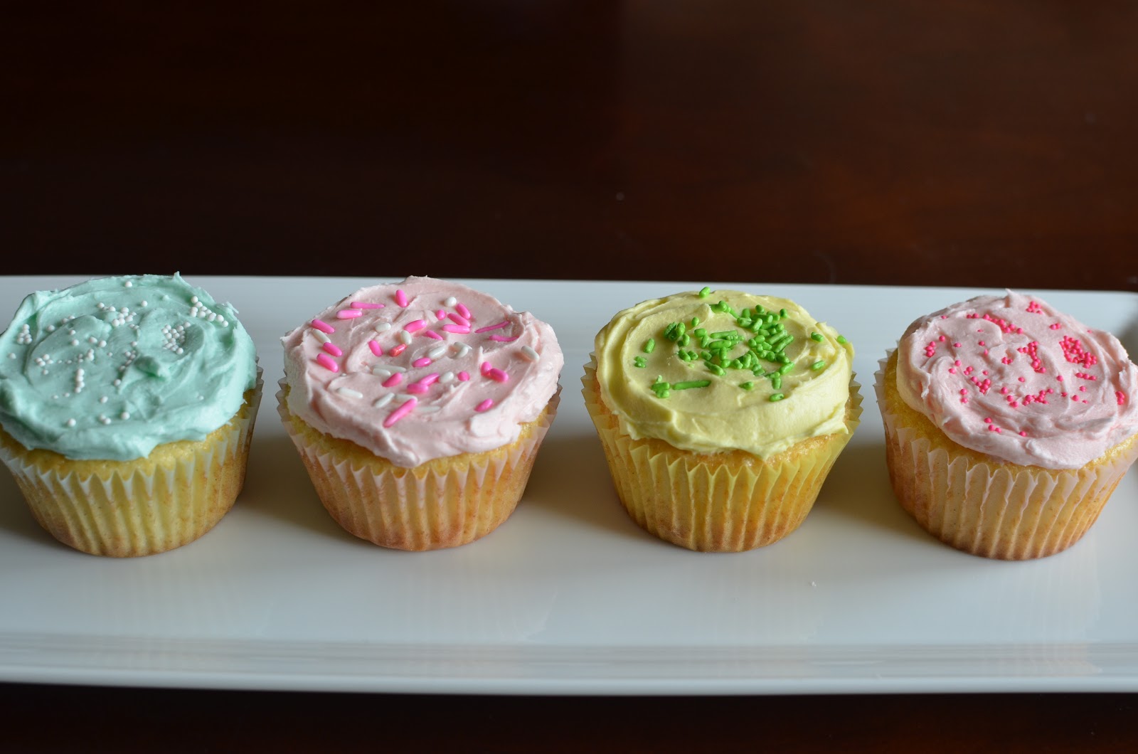 Playing with Flour Vanilla bean cupcakes with buttercream frosting for