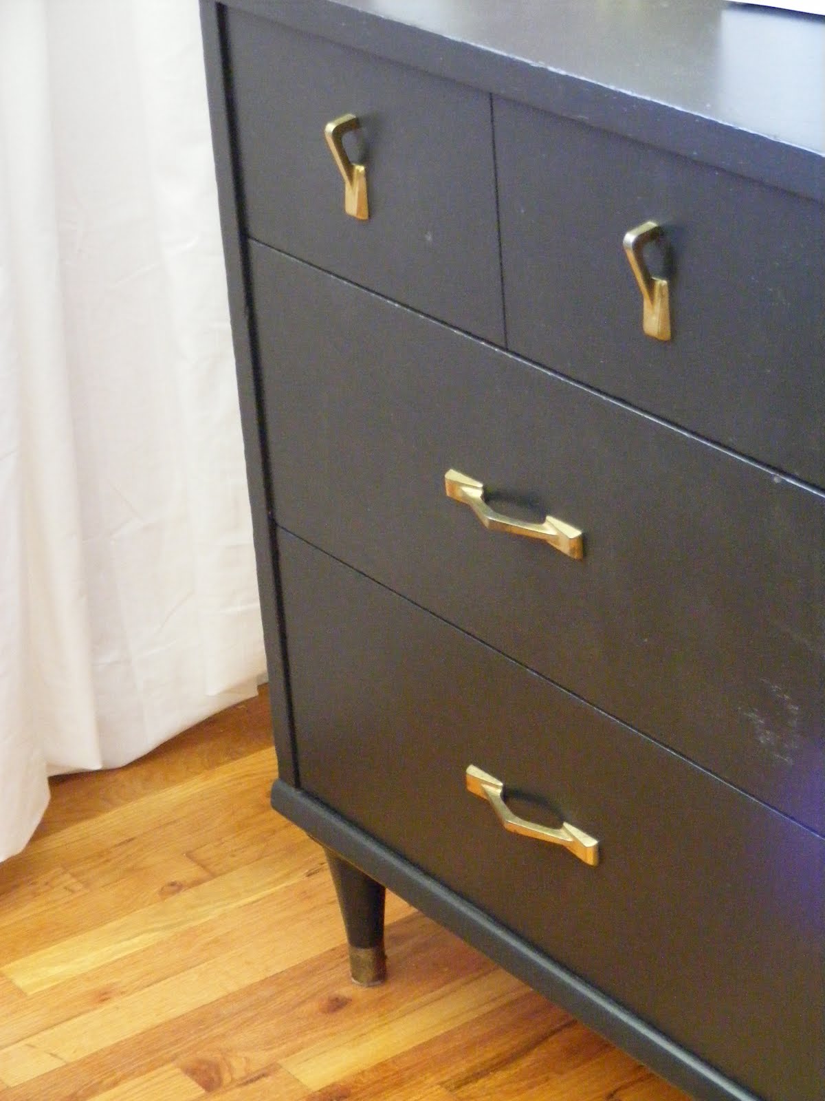 Megity's Handmade Painting a dresser....