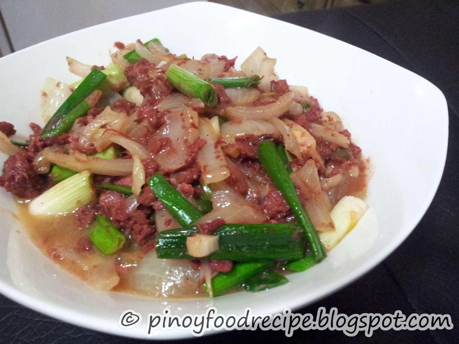 Pinoy Food Recipes Sautéed Corned Beef with Onion Leaves