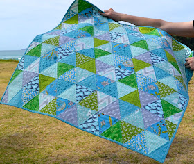 blue green sixty degree triangle baby quilt