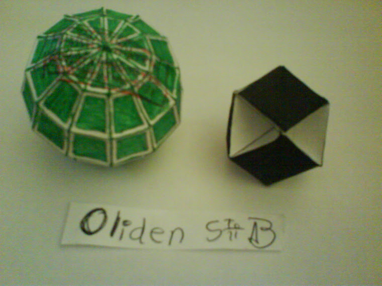 Modelo de papel de un cubohemioctaedro y  hebdomicontadissaedro