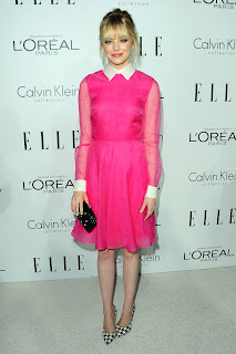 Emma Stone cute in a pink dress on the red carpet, 