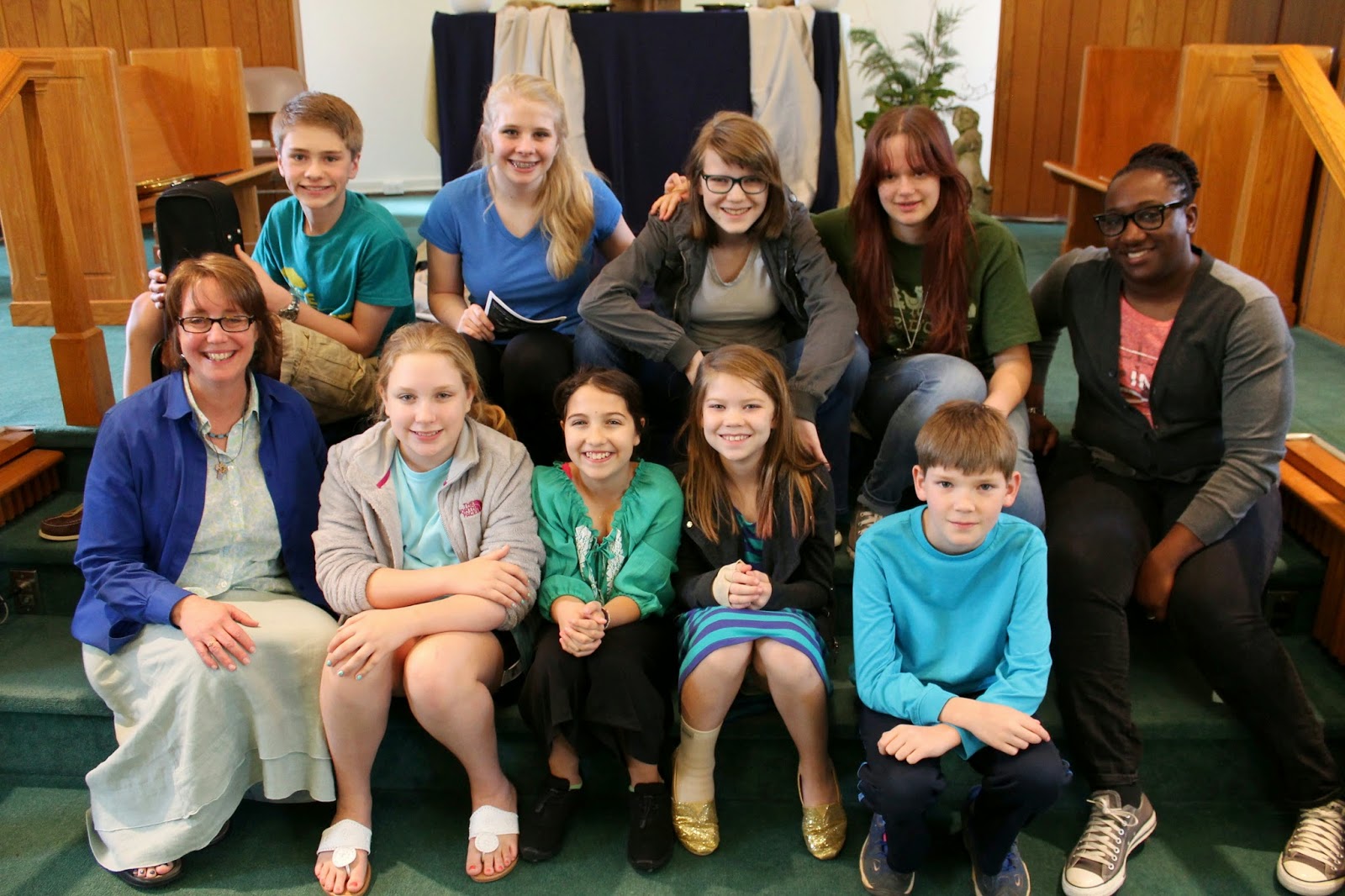 Youth group members smile at the camera on Youth Sunday 2014