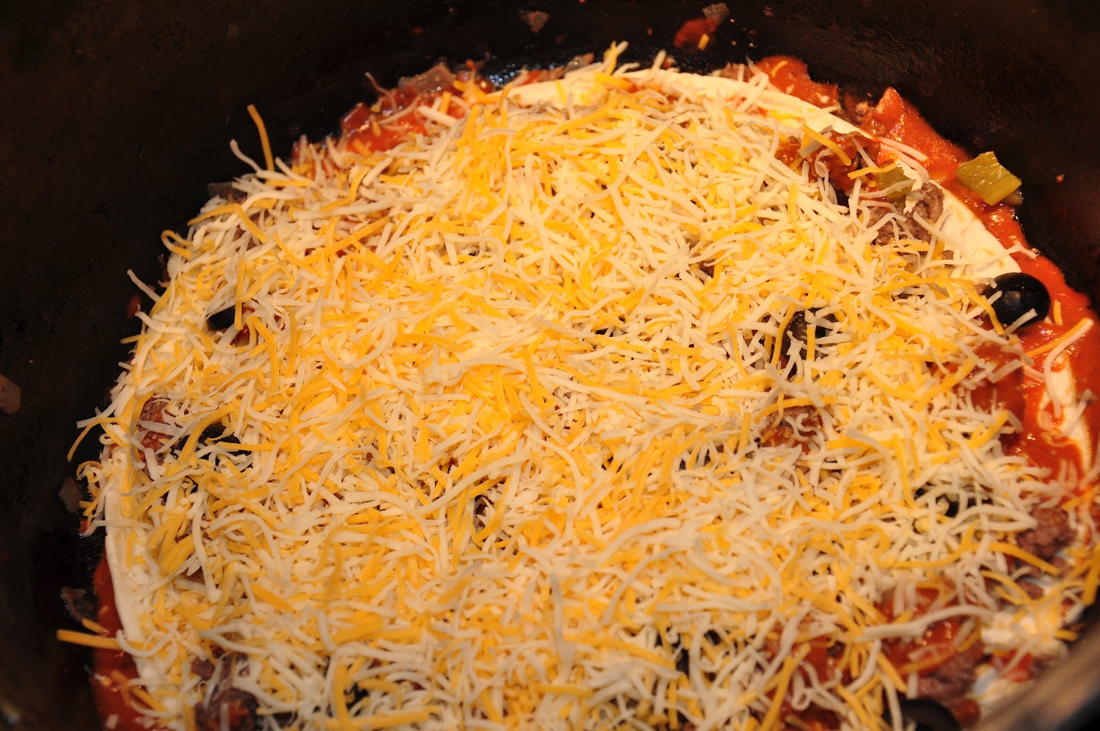 The Changeable Table Stacked Enchilada Dutch Oven Pie