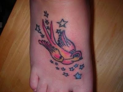 swallow tattoo On Foot