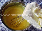 Prajitura Krantz cu foi si nuci caramelizate Preparare reteta crema - incorporam untul dupa ce a fiert la bain-marie