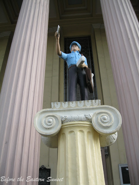 The Postman in front of Manila Central Post Office.