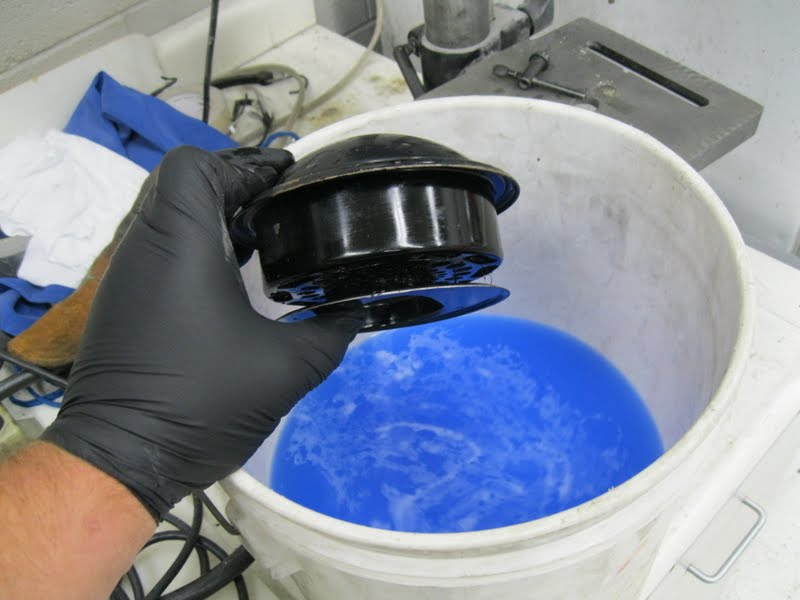 The Bug Boys Cleaning an oil bath air cleaner