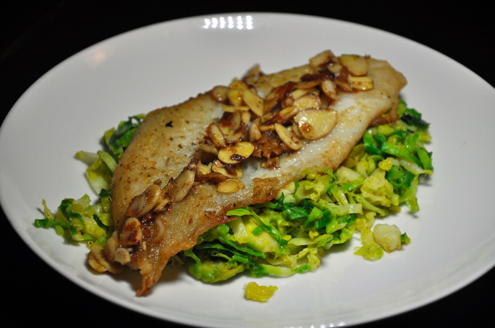 Slice of Rice Dover Sole Almondine with Brussels Sprouts