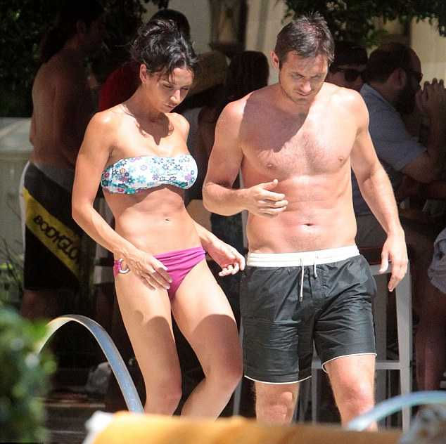 Matching muscles Christine Bleakley and Frank Lampard show off their toned