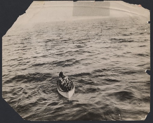 A Titanic lifeboat approaches the rescue ship, Carpathia