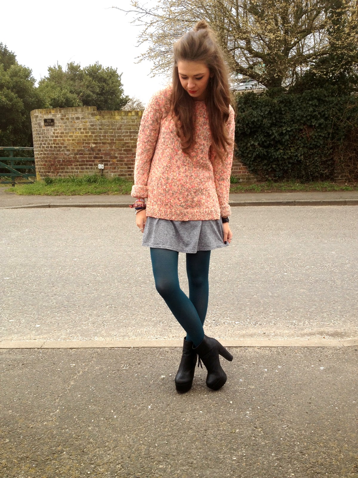 SC Oversized jumper styled with turquoise tights