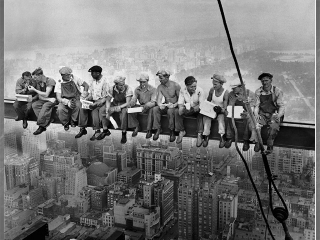 workers eating lunch on beam workers eating lunch on beam