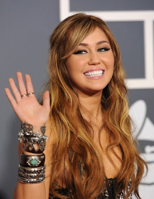 miley cyrus 2011 pictures. Does+miley+cyrus+have+a+