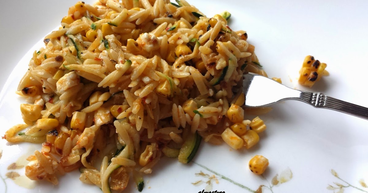Moroccan orzo salad with roasted corn, zucchini and harissa