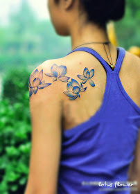light blue lotus flower tattoo designs on the back