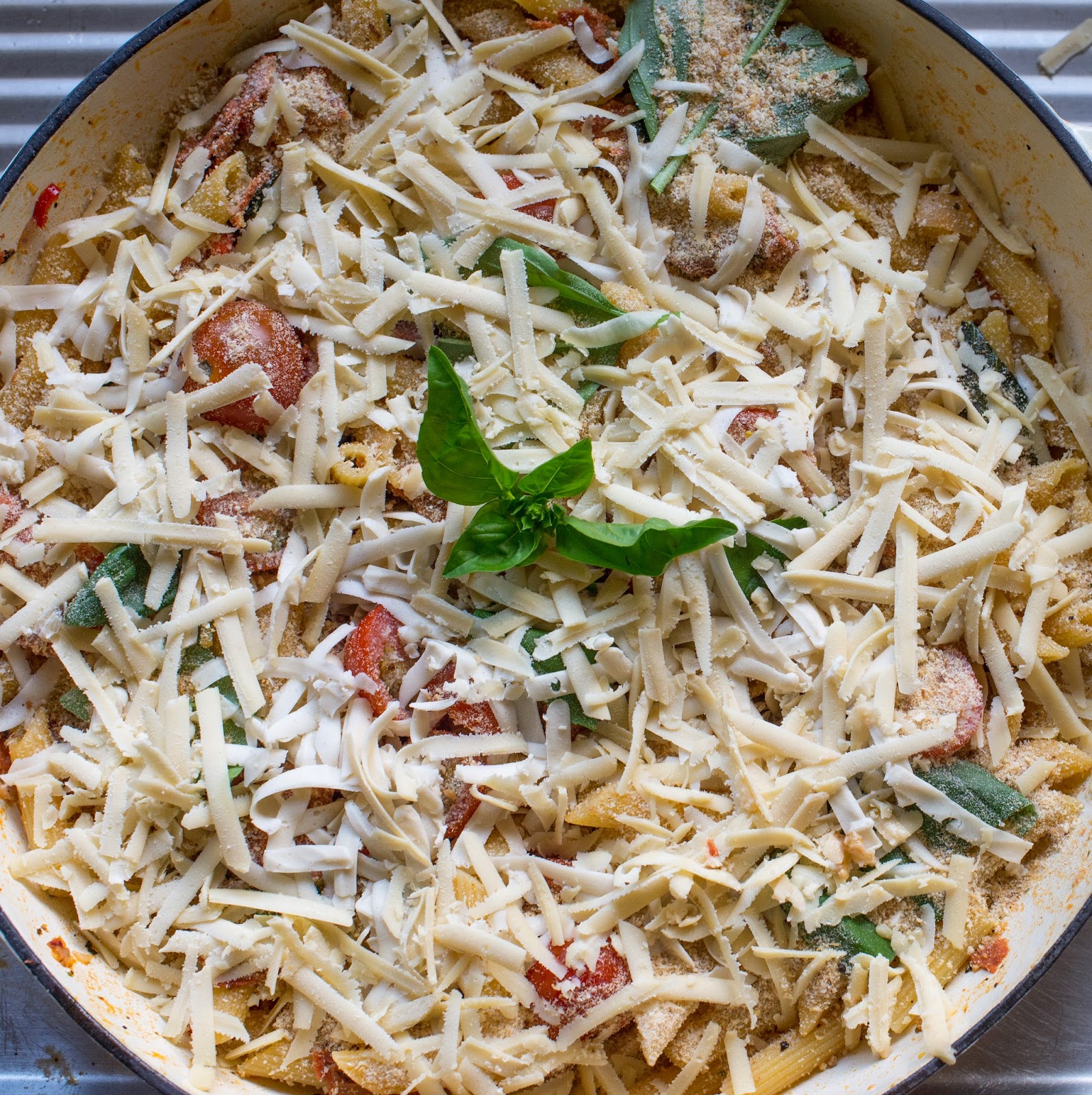 Vegan in Melbourne Vegan salami, tomato, and basil pasta bake.