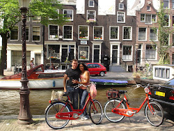 Riding along the canels of Amasterdam...