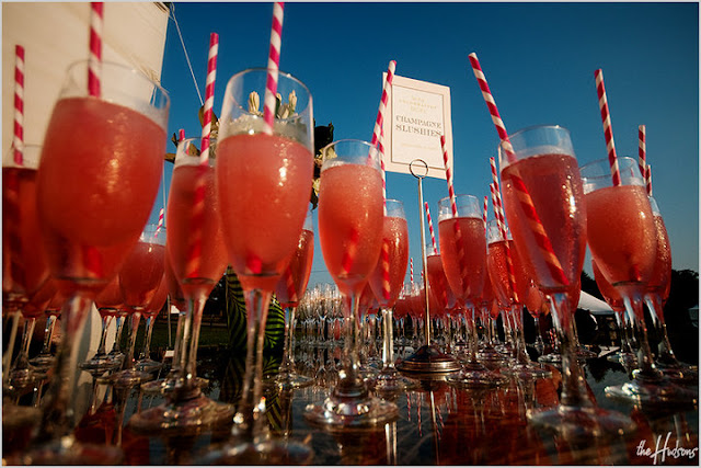  a table of refreshing champagne slushies for a hot late summer wedding