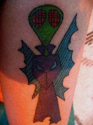 tattoos on black people. alien tattoos