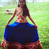Big Girl in Blue Floral Skirt
