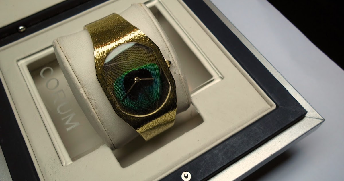YANHO WATCHES AND JEWELLERY Rare!!Corum Gold Watch Peacock Feather Dial