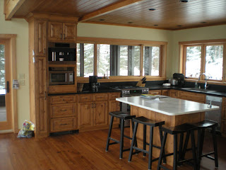 alder cabinets with honed marble top, https://huismanconcepts.com/