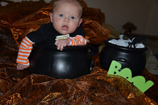 Baby in Halloween cauldron 