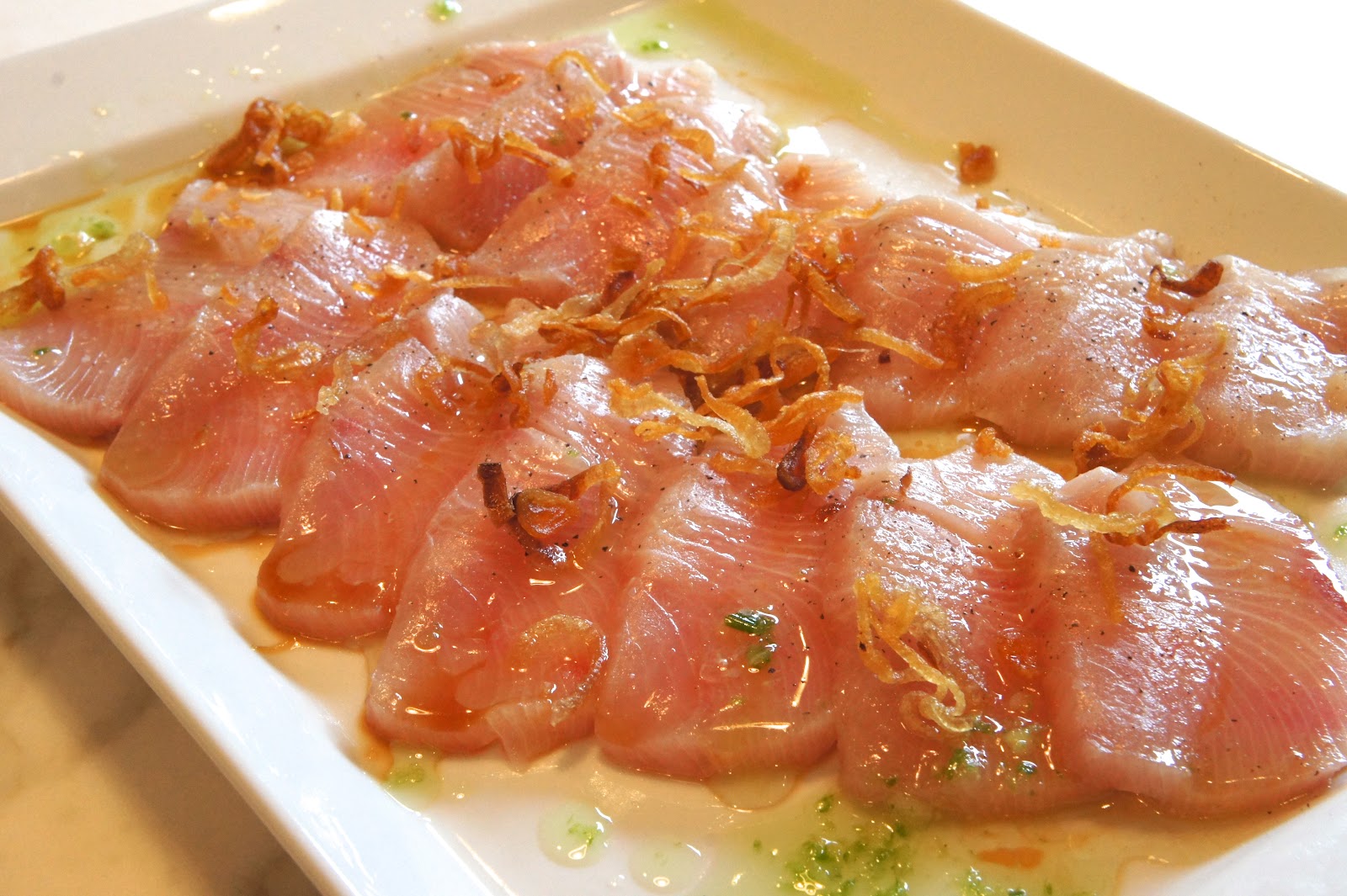 Hamachi Crudo with Scallion Oil, Soy Vinaigrette and Crispy Shallots